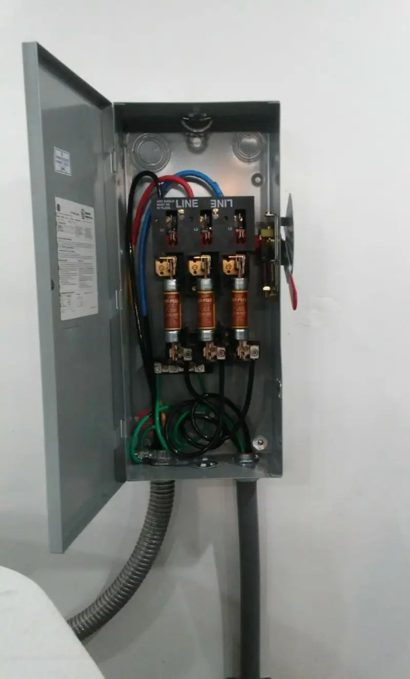 Three-phase disconnect switch installed for Smoke Detector Installation in Kirkwood